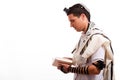 Side view of young jewish man with book Royalty Free Stock Photo