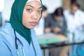 Female surgeon in hijab looking at camera in the hospital Royalty Free Stock Photo