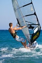 Side view of young windsurfer Royalty Free Stock Photo