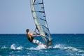 Side view of young windsurfer Royalty Free Stock Photo