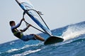 Side view of young windsurfer Royalty Free Stock Photo