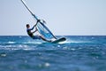 Side view of young windsurfer Royalty Free Stock Photo