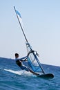 Side view of young windsurfer Royalty Free Stock Photo