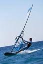 Side view of young windsurfer Royalty Free Stock Photo