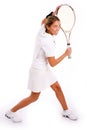 Side view of young woman playing tennis Royalty Free Stock Photo