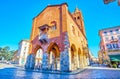 The side wall with arcades of Palazzo dell\'Arengario, the ancient townhall of Monza, Italy