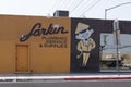 Larkin Plumbing Services and Supplies logo and cartoon, Las Vegas, Nevada.