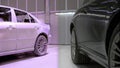 A sidebyside comparison of a physical machine and its digital twin on a screen demonstrating realtime discrepancies in