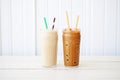 sidebyside iced coffees showing different milk alternatives Royalty Free Stock Photo