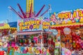 Sideshow Alley With Food And Game Stalls At A Funfair