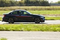 Sideview of black BMW car on road Royalty Free Stock Photo