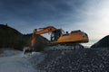 Sideview of huge orange shovel excavator Royalty Free Stock Photo