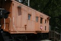 Sideview of Vintage Caboose with Old Milwaukee Road Sign Royalty Free Stock Photo