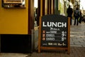 Sidewalk cafe menu board with writings lunch time