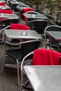 Sidewalk cafe with plastic wicker chairs Royalty Free Stock Photo