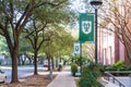 Sidewalk on campus of Tulane University with logo on banners in New Orleans, LA Royalty Free Stock Photo