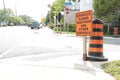 tor, canada - august 14, 2023: sidewalk closed pedestrians use other sidewalk writing caption text orange black 19 p 17 h