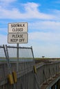 Sidewalk closed, please keep off signs closing a sidewalk Royalty Free Stock Photo