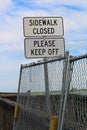 Sidewalk closed, please keep off signs closing a sidewalk Royalty Free Stock Photo