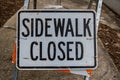 Sidewalk Closed Sign Fills Frame Royalty Free Stock Photo