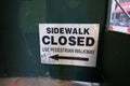 Sidewalk Closed Sign Posted on Wall in New York City Royalty Free Stock Photo