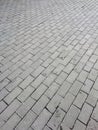 Sidewalk gray tile. Background of street tiles