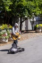 Sidewalk Musician on a sunny day in Seattle Royalty Free Stock Photo