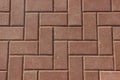 Sidewalk paved with rectangular red tiles Royalty Free Stock Photo