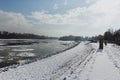 Sidewalk and river dam covered with slush and snow in Szentendre, Hungary