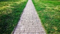 Sidewalk. Straight path of granite gray cobblestone