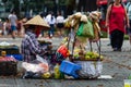 Sidewalk street seller Ho Chi Minh City Royalty Free Stock Photo