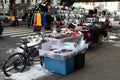 Sidewalk Vender Selling Masks and Winter Accessories during the Covid 19 Pandemic in Astoria Queens of New York City