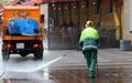 Sidewalk washing with water from a hose