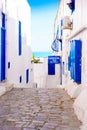 Sidi Bou Said Alley, Picturesque Street, Arabic Architecture, Hotel Sign, White and Blue Tunisian Alley Royalty Free Stock Photo