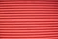 Siding of blinds metal red louvers background Royalty Free Stock Photo