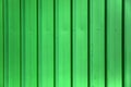 Siding green metal vertical panels texture Royalty Free Stock Photo