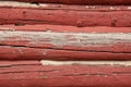 siding of an old red log barn with peeling paint Royalty Free Stock Photo