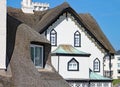 SIDMOUTH, DEVON - APRIL 1ST 2012: The beautiful old thatched residence stands on the Sidmouth coast on a sunny day