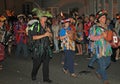 SIDMOUTH, DEVON, ENGLAND - AUGUST 10TH 2012: A group of musicians dressed in flowered hats and ragged waistcoats take part in the