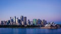 Sydney Opera House and city skyline at dawn