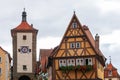 Siebersturm and famous tiny yellow crooked house with wood frami