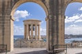 The Siege Bell War Memorial seen from Lower Barrakka Gardens, Valletta, Malta Royalty Free Stock Photo