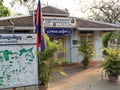 Closed entrance of the Tourist Information Center on National Route Airport Road and a sign with Cambodia tourist map