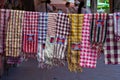 Siem Reap, Cambodia - 14 April 2018: Traditional cambodian scarves on souvenir market. Tourist souvenir shop