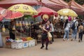 Siem Reap, Cambodia - 14 April 2018: Woman buys food on open fruit market.