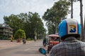 Siem Reap, Cambodia - August 3th, 2016: The tuk-tuk car driver, fast, not expensive, and convenient.