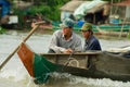 People ride motor boat at the Tonle Sap lake in Siem Reap, Cambodia. Royalty Free Stock Photo