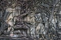 Bas relief sculpture, elephant charging into battle between the