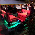 Motor rickshaw with neon Lexus, Asian taxi