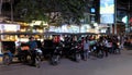 Rickshaws parked along the road, Asian taxi